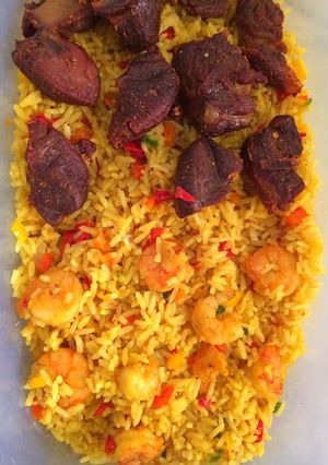 A picture of Shrimp stirred fried rice and fried beef.