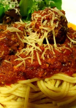 A picture of Meatballs stuffed with Mozzarella.