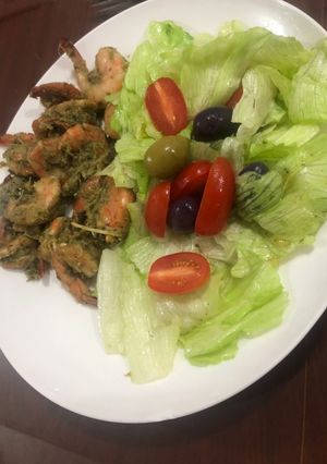 Una foto de Camarones al perejil
