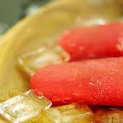 A picture of Watermelon juice popsicles.