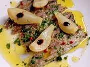 Una foto di alici marinate