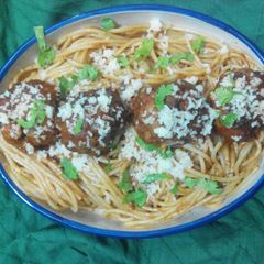 A picture of Spaghetti and chiballs with an Indian twist.