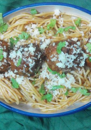 A picture of Spaghetti and chiballs with an Indian twist.