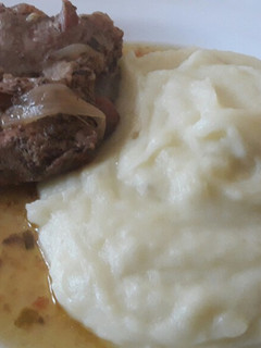 Una foto de Costillar de cerdo al jugo