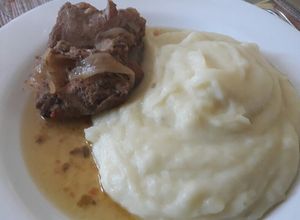 Una foto de Costillar de cerdo al jugo