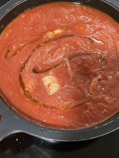 Una foto de Carne con tomate