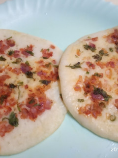 A picture of Onion Tomato Uttapam.