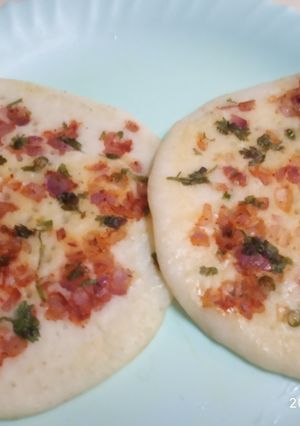 A picture of Onion Tomato Uttapam.