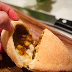 A picture of Japanese-Style Calzone with Roasted Soybeans & Curry.