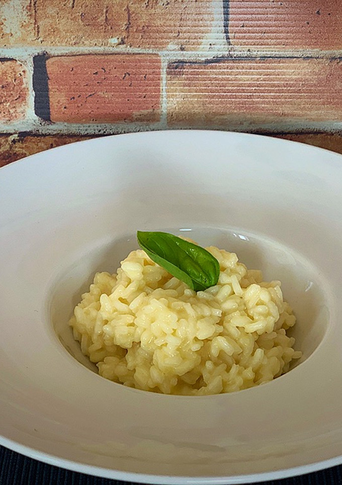 Una foto de Risotto de cheddar curado