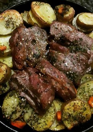 Una foto de Bondiola al horno con papas