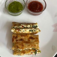 A picture of Cheesy Palak Paneer Lifafa.