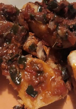 A picture of Boiled yam with scent leaf sauce.