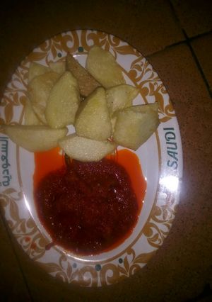 A picture of Fried yam and stew.