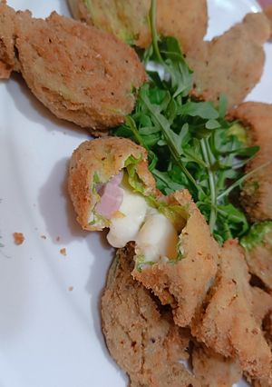 Foto di Fiori di zucca ripieni di prosciutto e provola