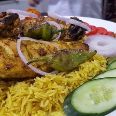Zafarani rice with tikka A picture of Zafarani rice with tikka.