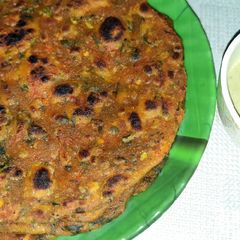 A picture of Carrot & Fenugreek leaves paratha.