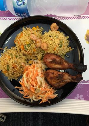 A picture of Basmati rice,coleslawband grilled chicken.