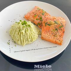 A picture of Salmon & Mashed Veggies with Spring Onion & Chives Cream Cheese.