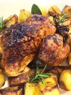 Foto di Galletto alla birra con patate al forno