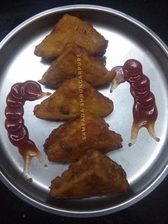 ब्रेड पकोडा (bread pakoda recipe in marathi) रेसिपी चे मुख्य फोटो