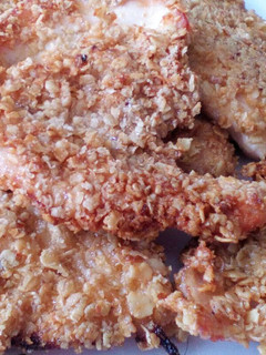 Una foto de Pollo al limón rebozado en avena