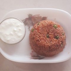 Tomato dalia pulao A picture of Tomato dalia pulao.
