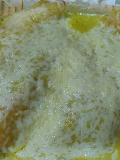A picture of Stuffed crepes with Mexican green sauce.