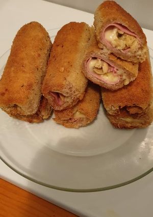 Foto principal de Canutillos de pollo con pavo y queso