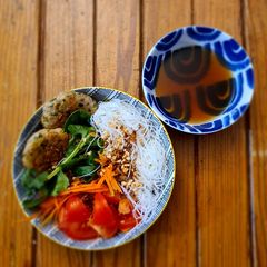 Vermicelli salad with coriander chicken meatballs A picture of Vermicelli salad with coriander chicken meatballs.