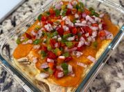 Una foto de enchiladas al horno