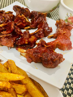 A picture of Red Spicy Sriracha & Bbq sauce baked chops.