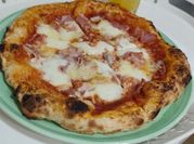 Una foto de pizza proteína