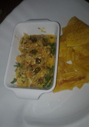Una foto de Pescado "robalo" con queso y alcaparras
