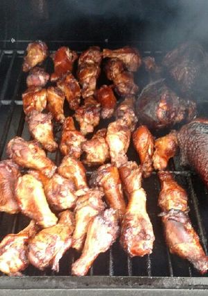 A picture of Applewood Smoked wings and turkey legs.