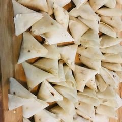 A picture of One bite samosa.