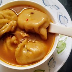 A picture of Chicken momo soup.