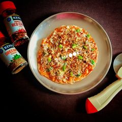 A picture of Nutritious Sorghum Flour - Cheese spread - Pizza.
