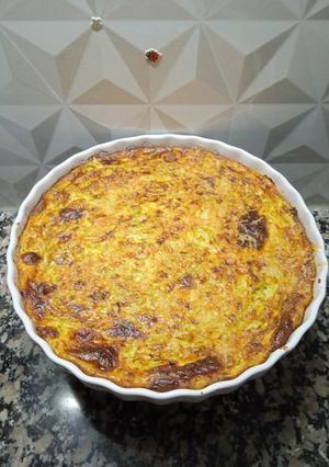 Una foto de Fainá de zucchinni y zanahorias