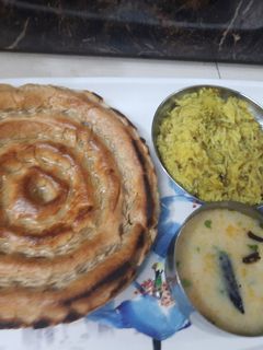 Rajasthani thali (khooba roti, mungdal khichadi) रेसिपी मुख्य फोटो