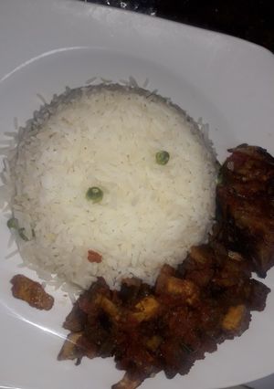 A picture of White rice and gizdodo sauce.