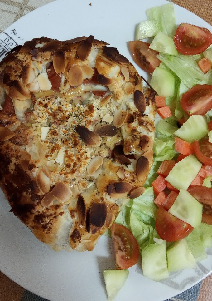 Una foto de Tortilla de Frankfurt en hojaldre al horno