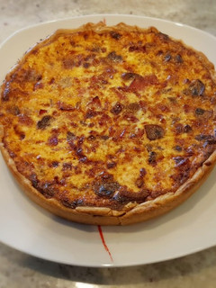 Una foto de Quiche de hongos y bacon