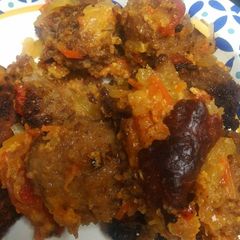 A picture of Meatballs with Tomato with Apple Sauce.