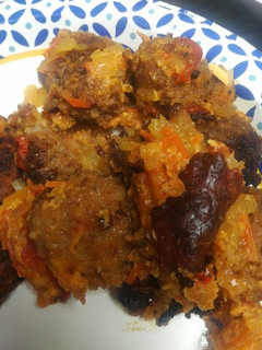 A picture of Meatballs with Tomato with Apple Sauce.