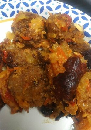 A picture of Meatballs with Tomato with Apple Sauce.
