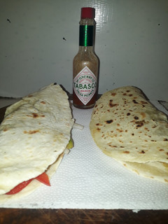 Una foto de Tacos de cerdo y verduras