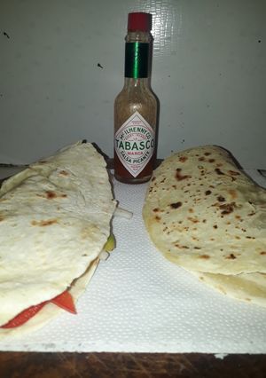 Una foto de Tacos de cerdo y verduras