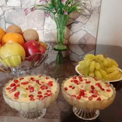 A picture of Fruit salad with custard.
