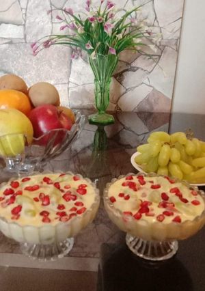 A picture of Fruit salad with custard.